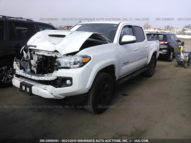 3TMAZ5CN7GM010210 - 2016 TOYOTA TACOMA DBL CAB/SR5/TRD SPORT/OR WHITE photo 2