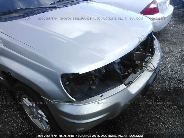 1J4GW48S24C191803 - 2004 JEEP GRAND CHEROKEE LAREDO/COLUMBIA/FREEDOM 银色 照片 6