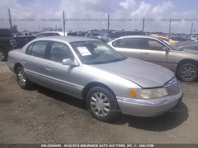 1LNHM97V22Y683428 - 2002 LINCOLN CONTINENTAL  Күміс фото 1