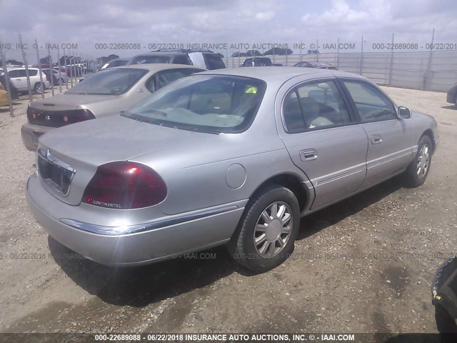 1LNHM97V22Y683428 - 2002 LINCOLN CONTINENTAL  Күміс фото 4