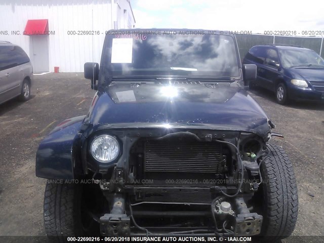 1C4HJWEG8CL190352 - 2012 JEEP WRANGLER UNLIMITE SAHARA BLACK photo 6