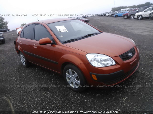 KNADE223796569988 - 2009 KIA RIO LX/SX ORANGE photo 1