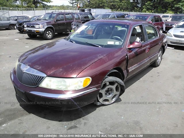 1LNHM97V1YY811750 - 2000 LINCOLN CONTINENTAL  RED photo 2