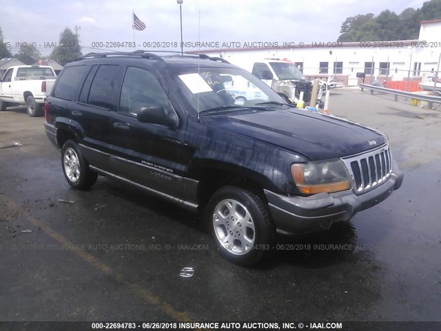 1J4GX48S81C725590 - 2001 JEEP GRAND CHEROKEE LAREDO BLACK photo 1