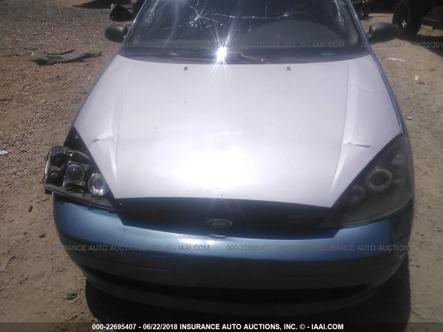 1FAFP33P9YW320206 - 2000 FORD FOCUS LX Light Blue photo 6