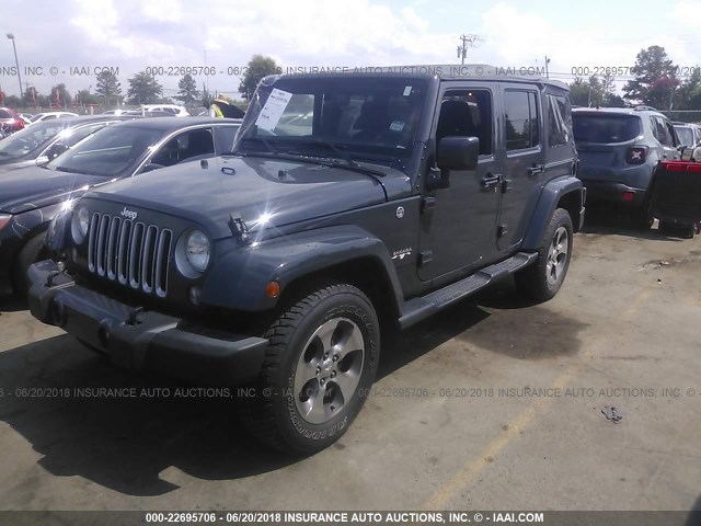 1C4BJWEG9GL176567 - 2016 JEEP WRANGLER UNLIMITE SAHARA BLUE photo 2