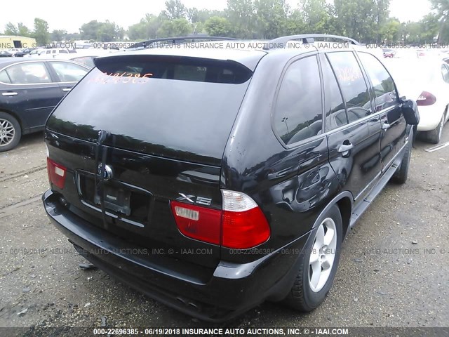5UXFB33542LH30946 - 2002 BMW X5 4.4I BLACK photo 4