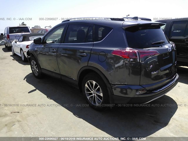 JTMRJREV1JD159049 - 2018 TOYOTA RAV4 HV LE PLUS/XLE GRAY photo 3