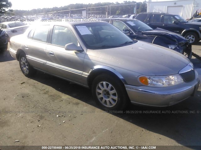 1LNHM97V01Y698394 - 2001 LINCOLN CONTINENTAL  TAN photo 1