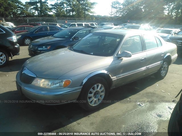 1LNHM97V01Y698394 - 2001 LINCOLN CONTINENTAL  TAN photo 2