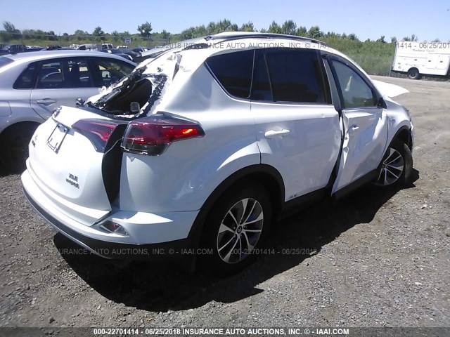 JTMRJREV6JD155966 - 2018 TOYOTA RAV4 HV LE PLUS/XLE WHITE photo 4