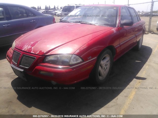 1G2NE55M8RC739696 - 1994 PONTIAC GRAND AM SE RED photo 2