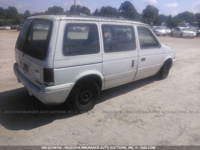 2P4GH2534NR616539 - 1992 PLYMOUTH VOYAGER WHITE photo 4