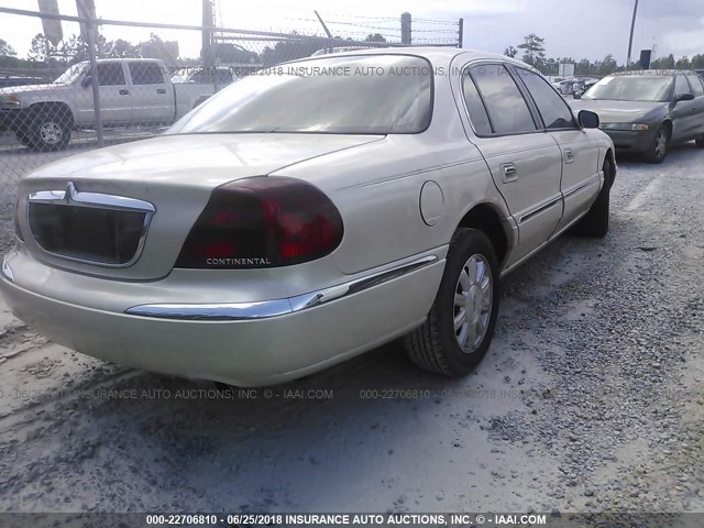 1LNHM97V5YY839910 - 2000 LINCOLN CONTINENTAL  CREAM photo 4