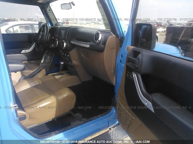 1J4BA5H11BL571878 - 2011 JEEP WRANGLER UNLIMITE SAHARA BLUE photo 5