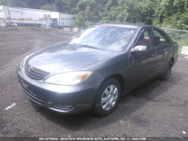 JTDBE32KX40271891 - 2004 TOYOTA CAMRY LE/XLE 灰色 照片 2
