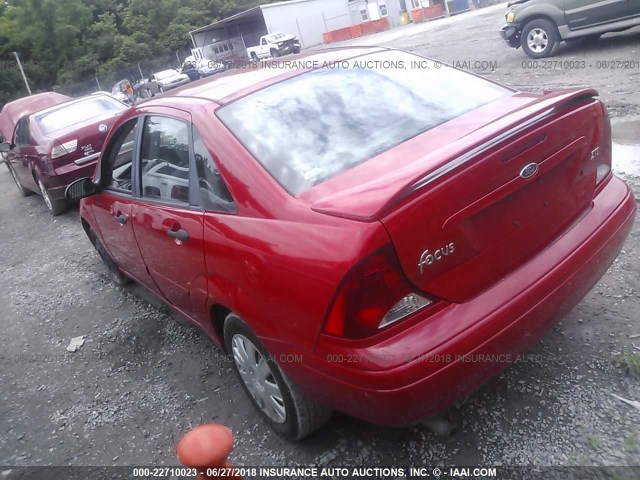 1FAFP38Z14W190989 - 2004 FORD FOCUS ZTS RED photo 3