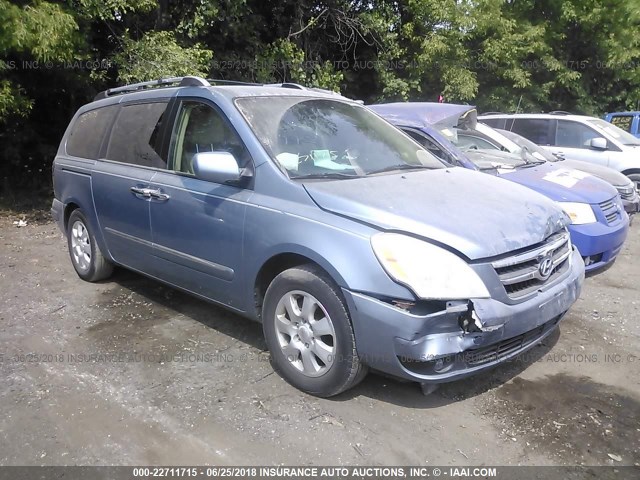 KNDMC233976031975 - 2007 HYUNDAI ENTOURAGE GLS/SE/LIMITED BLUE photo 1