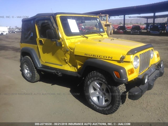 1J4FA69S64P755093 - 2004 JEEP WRANGLER / TJ RUBICON YELLOW photo 1