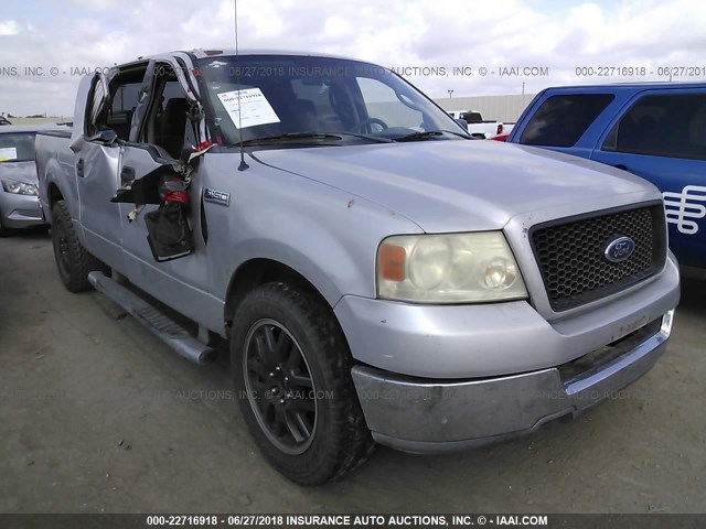 1FTRW12W34KD10103 - 2004 FORD F150 SUPERCREW GRAY photo 1