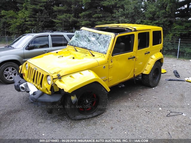 1J4BA5H17BL553725 - 2011 JEEP WRANGLER UNLIMITE SAHARA YELLOW photo 2