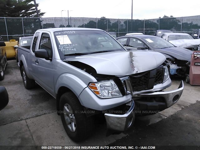 1N6AD06WX9C401939 - 2009 NISSAN FRONTIER KING CAB SE/LE/NISMO SILVER photo 1
