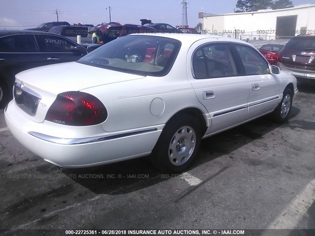 1LNFM97V0WY615044 - 1998 LINCOLN CONTINENTAL  WHITE photo 4