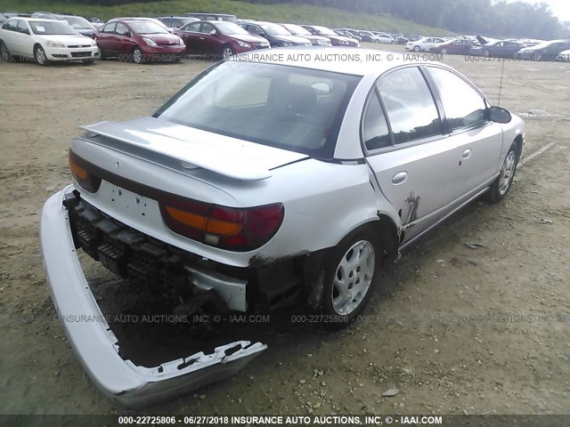 1G8ZJ52742Z295656 - 2002 SATURN SL2 SILVER photo 4