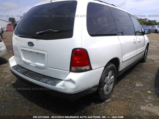 2FMZA576X4BA07730 - 2004 FORD FREESTAR SES WHITE photo 4