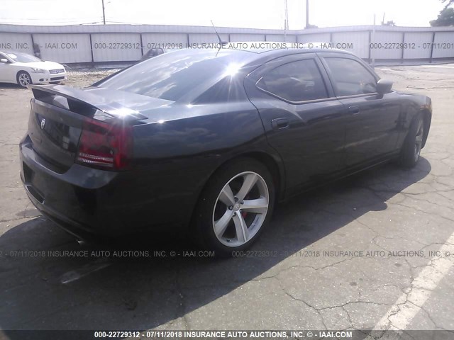 2B3KA73W18H150724 - 2008 DODGE CHARGER SRT-8 BLACK photo 4