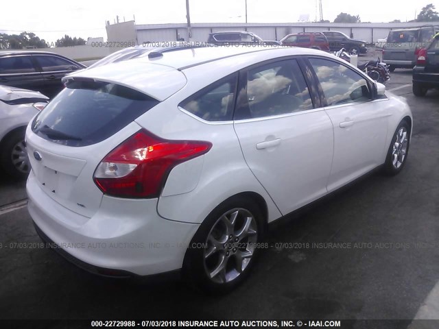 1FAHP3M26CL219646 - 2012 FORD FOCUS SEL WHITE photo 4