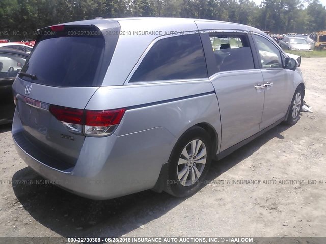 5FNRL5H62GB110645 - 2016 HONDA ODYSSEY EXL SILVER photo 4