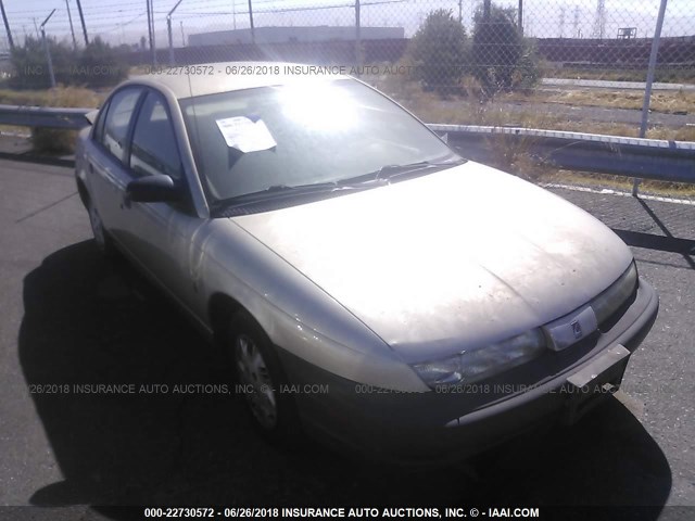 1G8ZH5287XZ101438 - 1999 SATURN SL1 GOLD photo 1