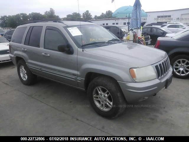 1J4GW58N8YC383250 - 2000 JEEP GRAND CHEROKEE LIMITED SILVER photo 1