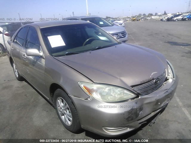 JTDBE32K640274870 - 2004 TOYOTA CAMRY LE/XLE Champagne photo 1