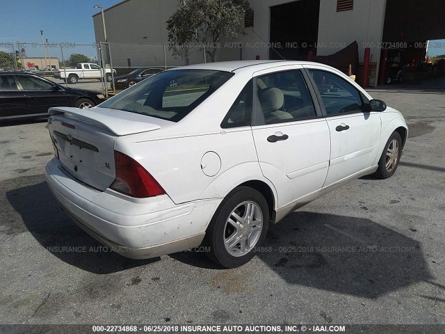 1FAFP34P13W340554 - 2003 FORD FOCUS SE/SE COMFORT/SE SPORT WHITE photo 4