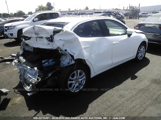 3MYDLBZV5GY146687 - 2016 TOYOTA SCION IA WHITE photo 4