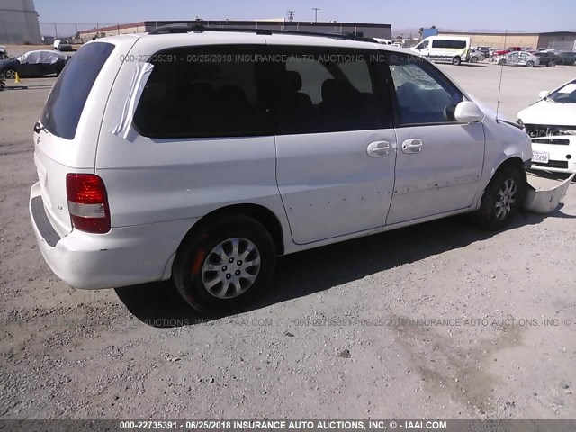 KNDUP131846542800 - 2004 KIA SEDONA EX/LX WHITE photo 4