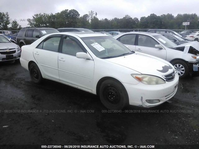 JTDBE32K340249361 - 2004 TOYOTA CAMRY LE/XLE WHITE photo 1