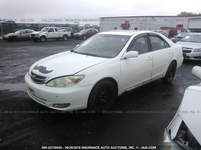 JTDBE32K340249361 - 2004 TOYOTA CAMRY LE/XLE WHITE photo 2