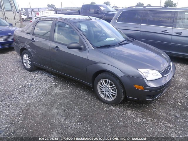 1FAFP34N37W169195 - 2007 FORD FOCUS ZX4/S/SE/SES GRAY photo 1