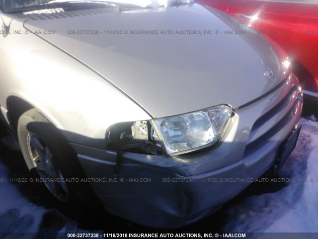 4N2ZN16TX2D810213 - 2002 NISSAN QUEST SE TAN photo 6