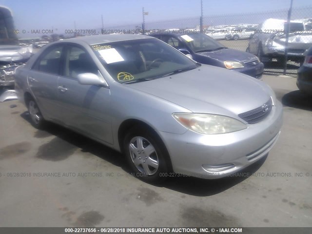 JTDBE32K930226651 - 2003 TOYOTA CAMRY LE/XLE SILVER photo 1
