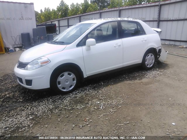 3N1BC11E29L351172 - 2009 NISSAN VERSA S/SL WHITE photo 2