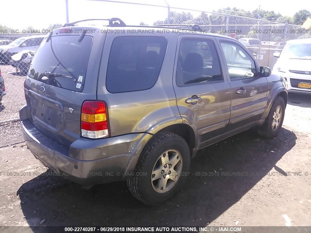 1FMCU94115KE49302 - 2005 FORD ESCAPE LIMITED BLACK photo 4