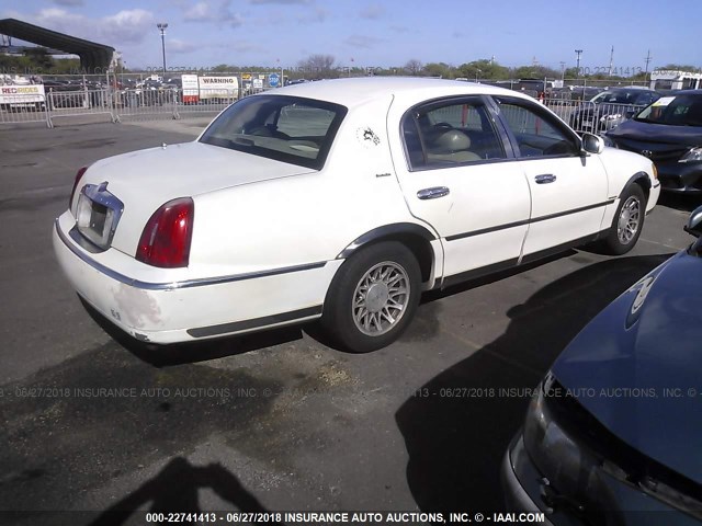 1LNHM81W3XY658895 - 1999 LINCOLN TOWN CAR EXECUTIVE WHITE photo 4