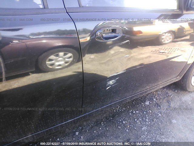 KL1TD56616B680666 - 2006 CHEVROLET AVEO LS BLACK photo 6