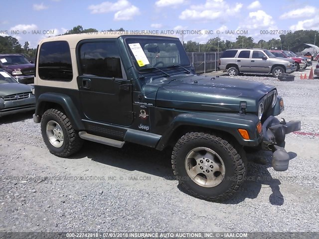 1J4FA59S8YP701245 - 2000 JEEP WRANGLER / TJ SAHARA GREEN photo 1