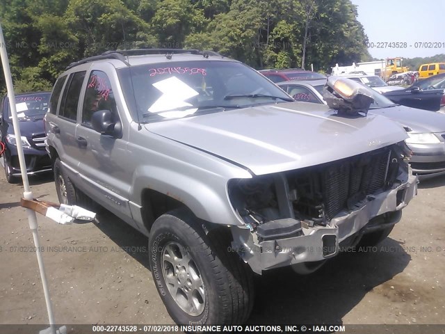 1J4GW48N1YC260688 - 2000 JEEP GRAND CHEROKEE LAREDO SILVER photo 1