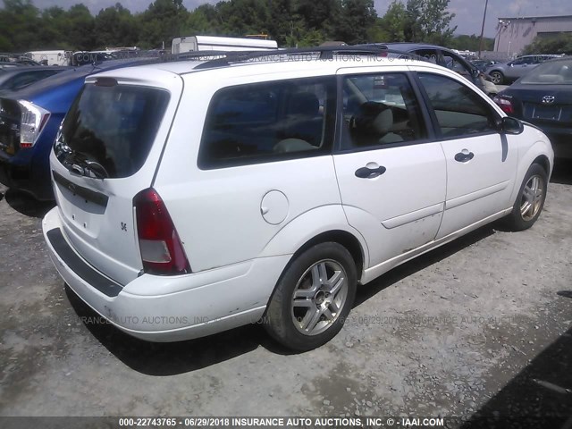 1FAFP36P6YW394226 - 2000 FORD FOCUS SE/SE COMFORT WHITE photo 4